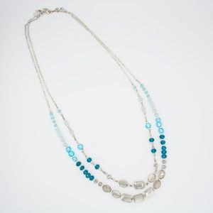 Magnificent blue and clear beaded long necklace